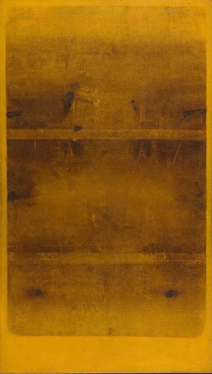 A study in warm ochre — a softly worn surface of mustard and umber, painterly and still.